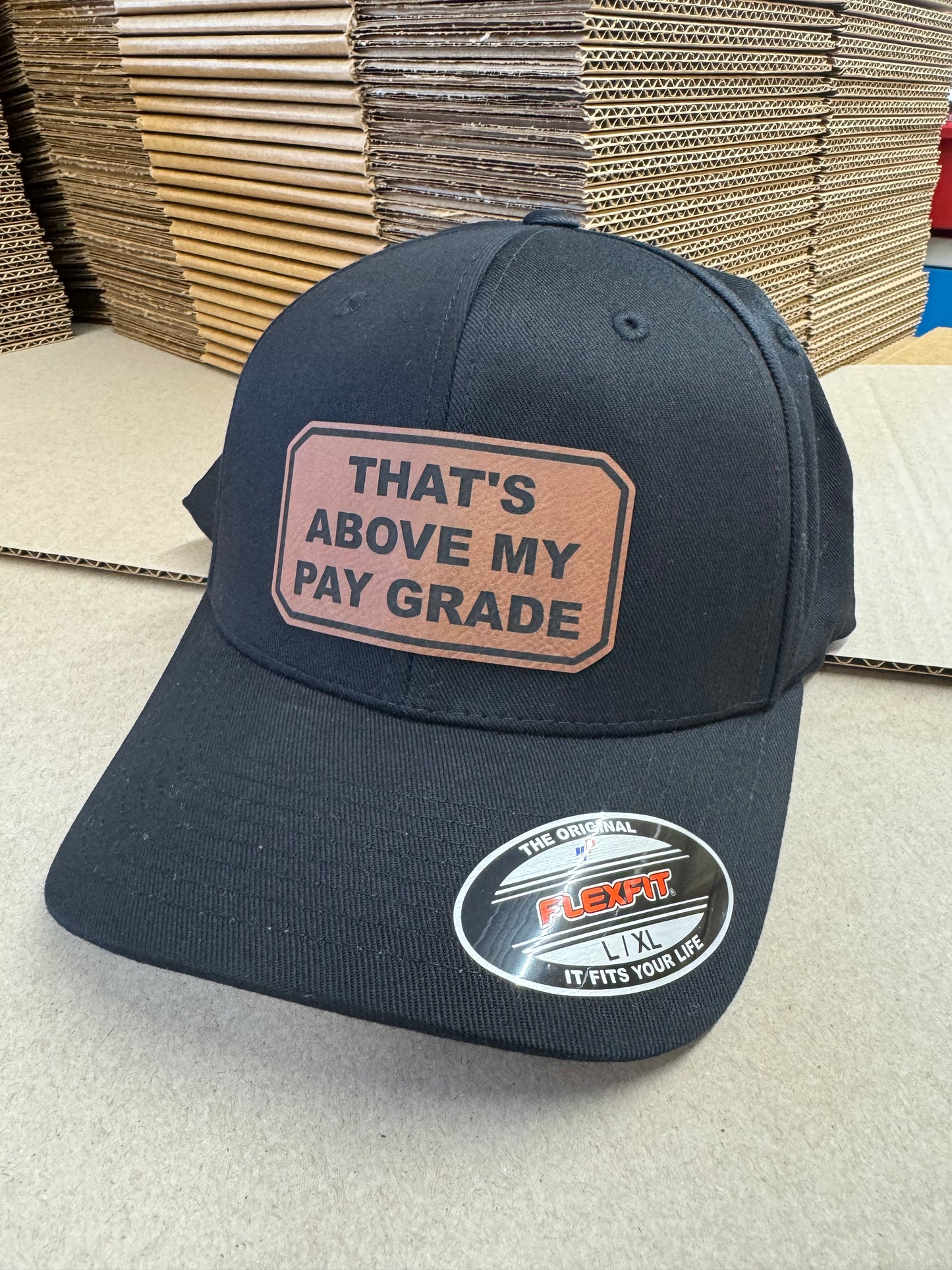 Above my pay grade hat